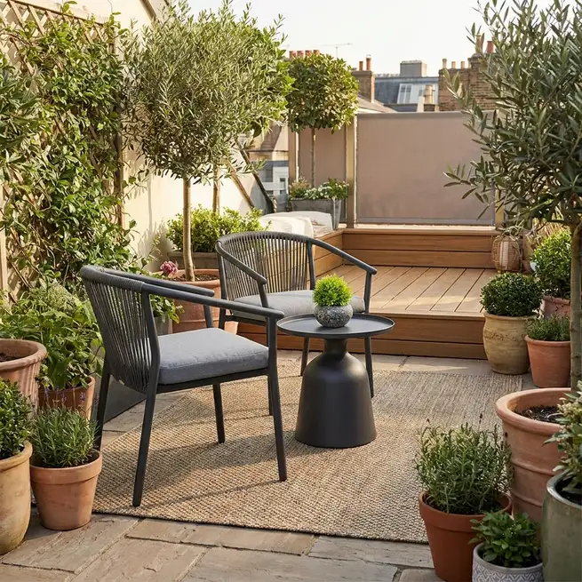 Elegant small balcony with compact lounge set